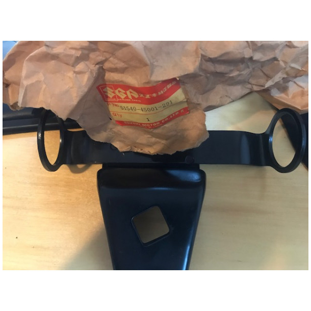 SUZUKI 5154045001 51540-45001-291 BRACKET,HEADLAMP LEFT GS750 77-79